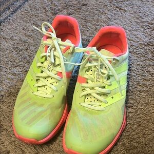 adidas Green and Pink Athletic Shoes Vibrant Design